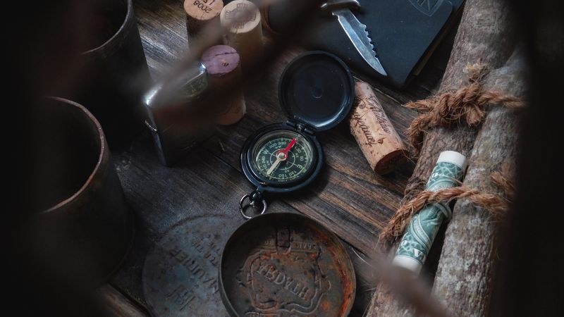 Vintage compass and old map - navigating without guidance