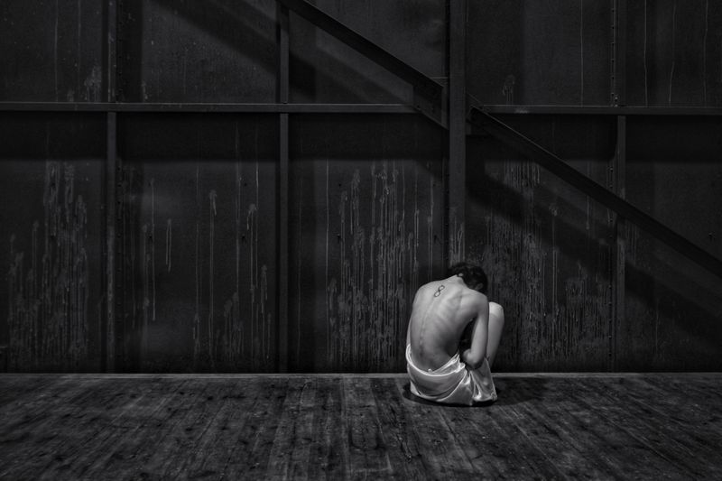 Person alone in open space - solitude and rebuilding